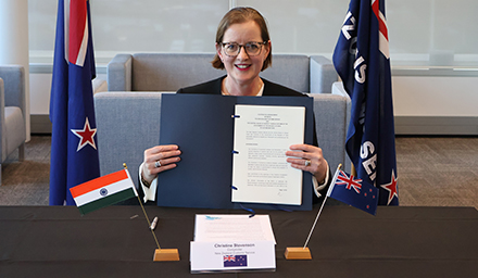 Christine Stevenson with the signed agreement